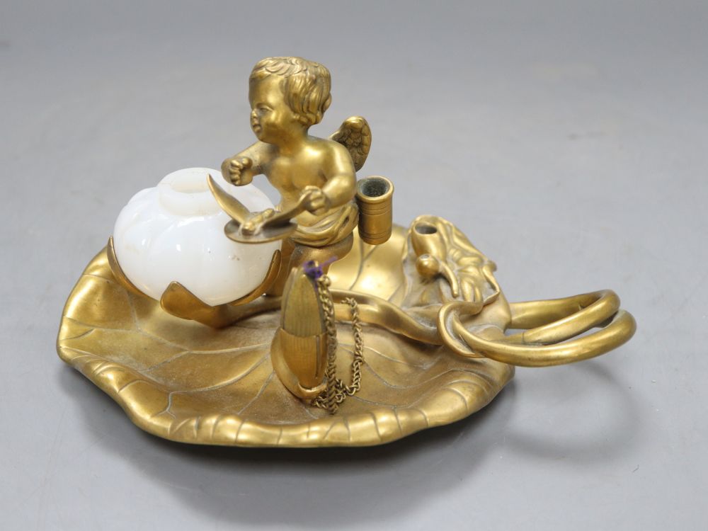 A Victorian ormolu cherub inkstand, length 20cm